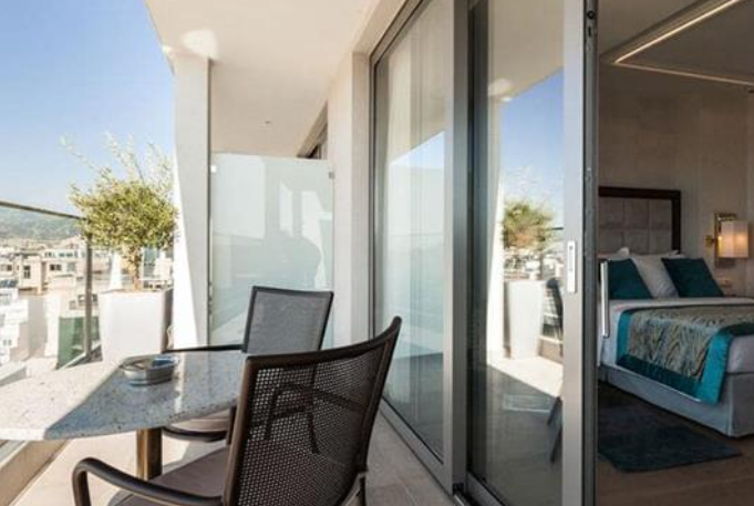 Châssis coulissant en aluminium à soulèvement 4 ventaux  SMARTIA S560 (L.:4450mm x H.:2200mm)